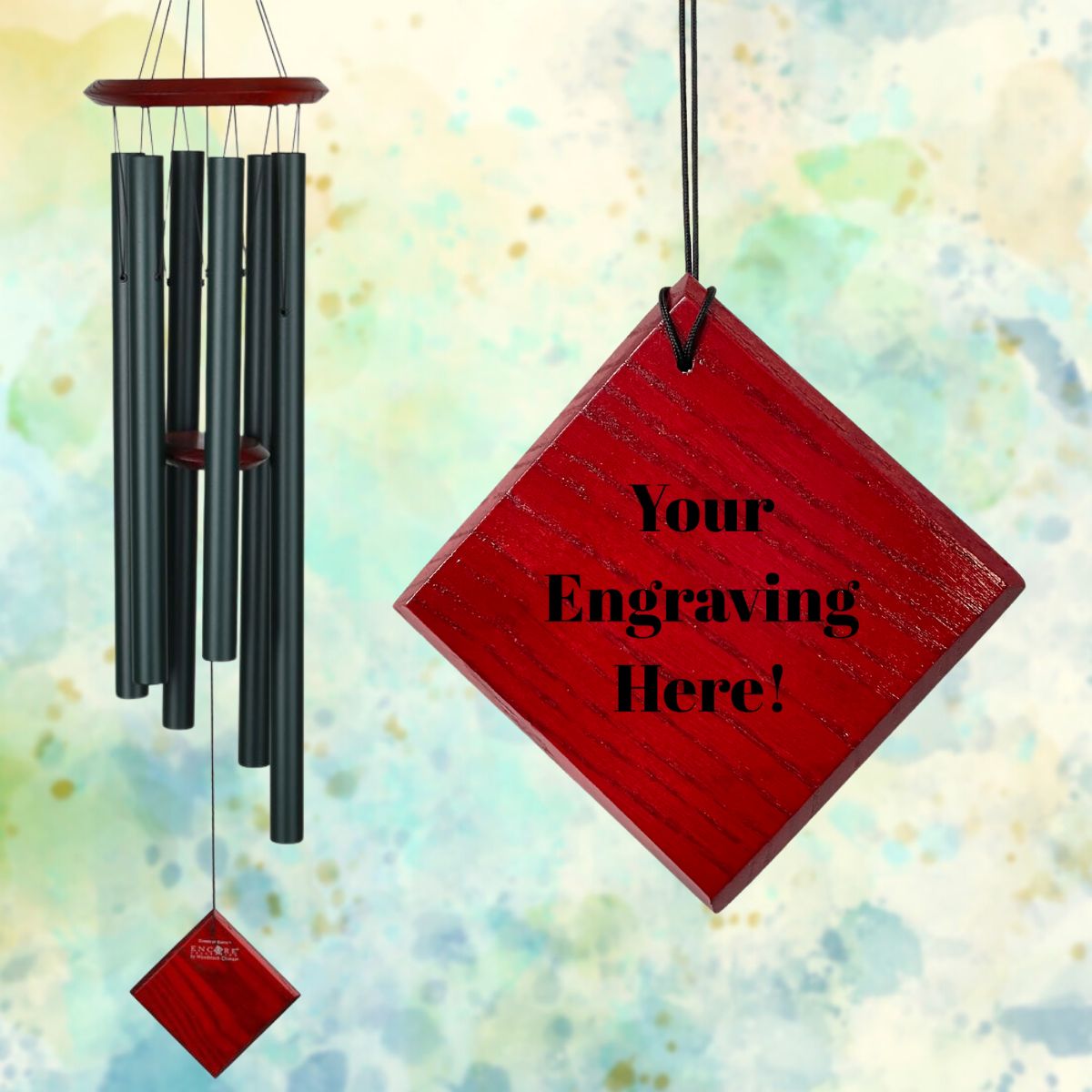 Woodstock brand 'Chimes of the Eclipse' EVERGREEN aluminum tubes wind chime that is 37 inches in length, with customizable red wooden wind sail displayed in front of a landscape background