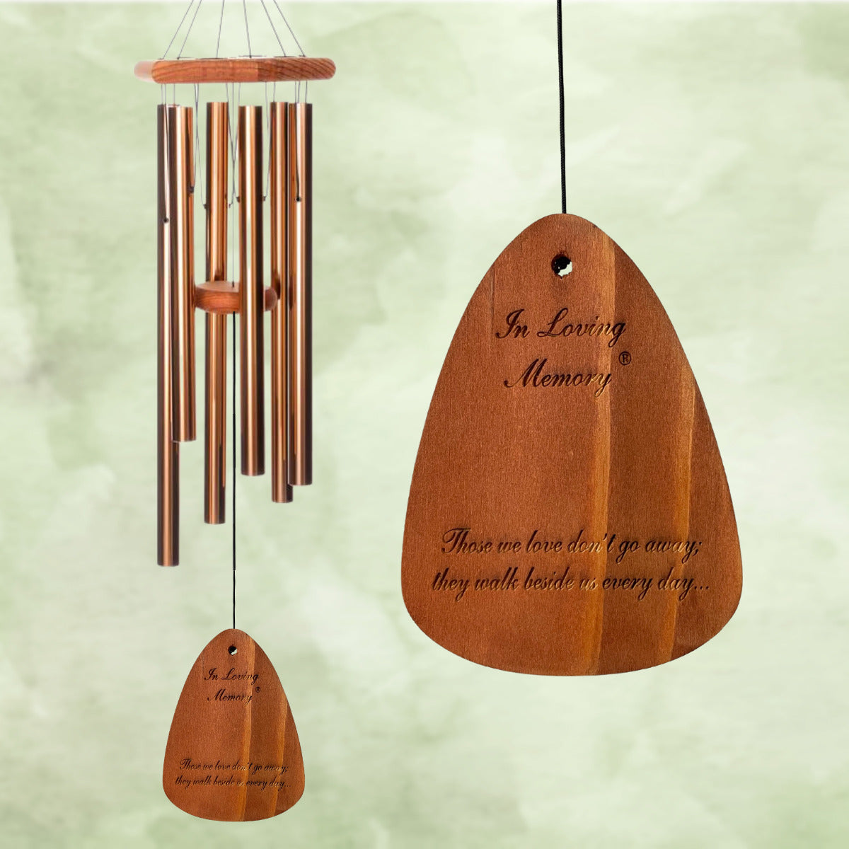 In Loving Memory BRAND wind chime THAT IS 35 inches WITH BRONZE ALUMINUM TUBES PRE-ENGRAVED with THE QUOTE, "THOSE WE LOVE DON'T GO AWAY; THEY WALK BESIDES US EVERY DAY..." ON THE WIND SAIL WHICH IS DISPLAYED IN FRONT OF A LANDSCAPE BACKGROUND