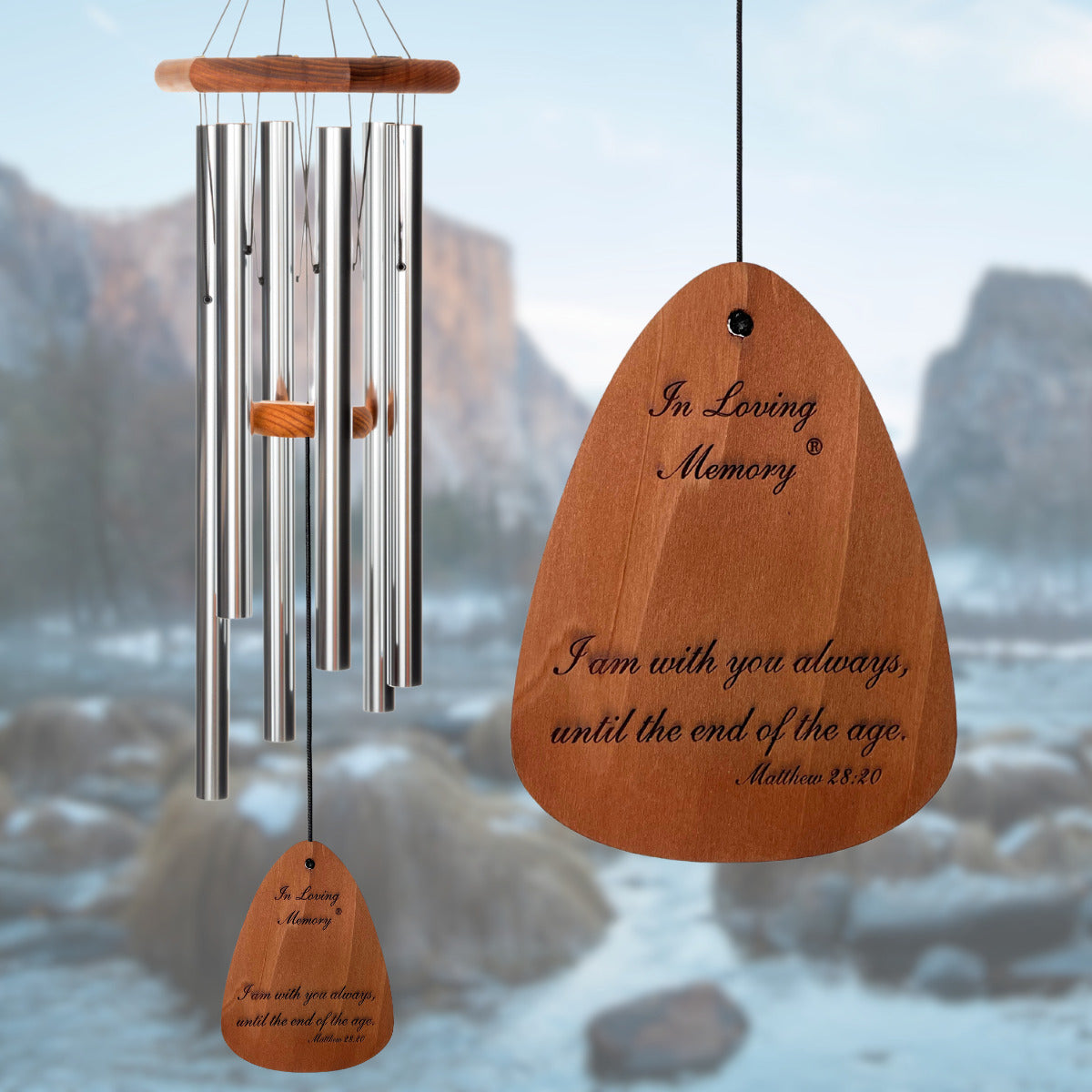In Loving Memory BRAND wind chime THAT IS 35 inches WITH SILVER ALUMINUM TUBES PRE-ENGRAVED with THE QUOTE, "I am with you always, until the end of the age. - Matthew 28:20" ON THE WIND SAIL WHICH IS DISPLAYED IN FRONT OF A LANDSCAPE BACKGROUND