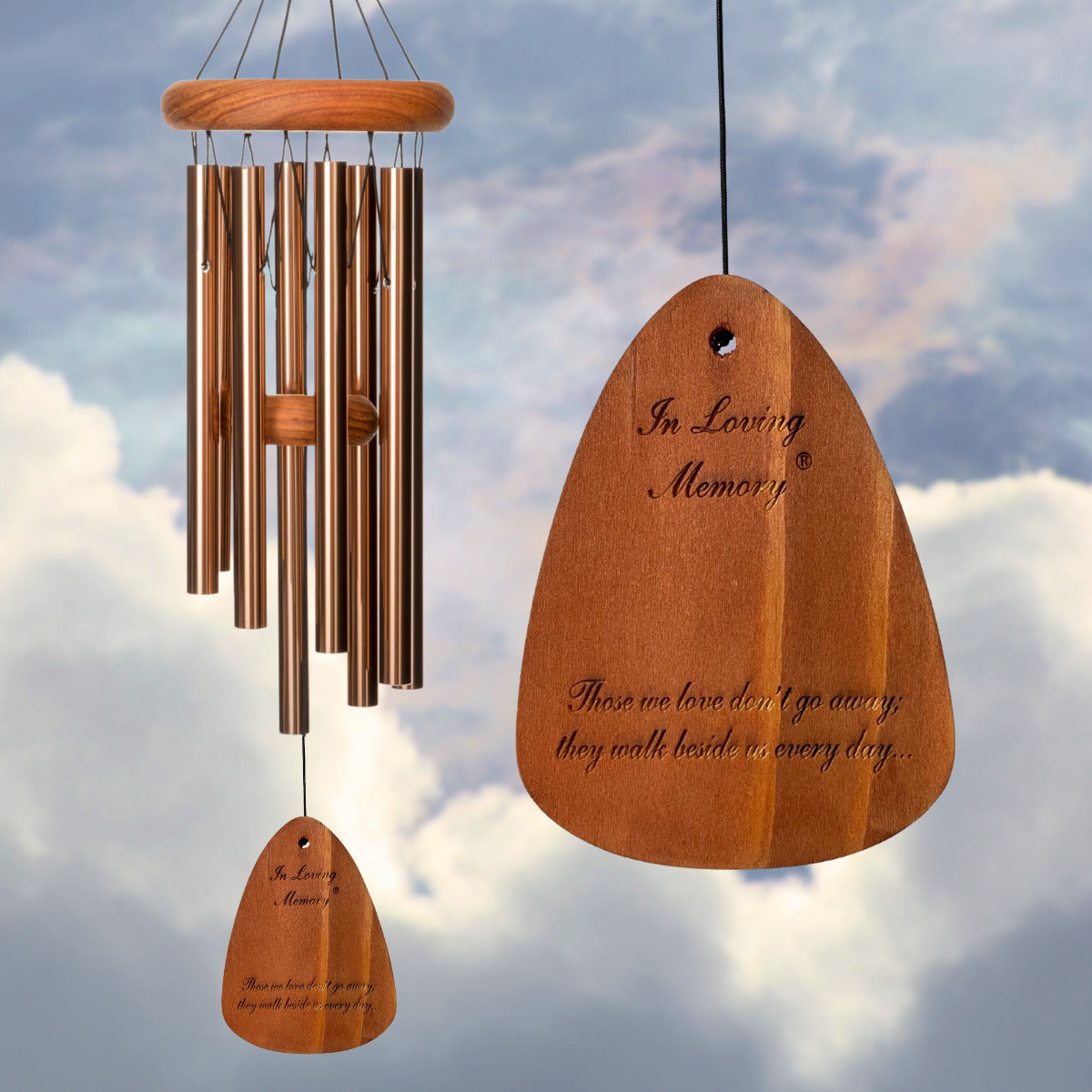 In Loving Memory BRAND wind chime THAT IS 18 inches WITH BRONZE ALUMINUM TUBES PRE-ENGRAVED with THE QUOTE, "THOSE WE LOVE DON'T GO AWAY; THEY WALK BESIDE US EVERY DAY..." ON THE WIND SAIL, ALL OF WHICH IS DISPLAYED IN FRONT OF A LANDSCAPE BACKGROUND