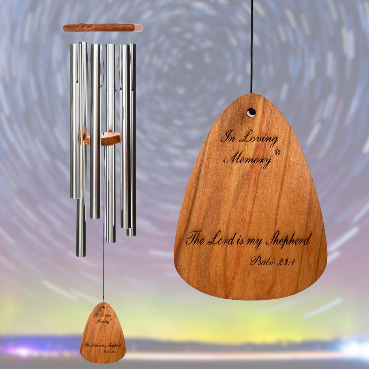 In Loving Memory 42 inch silver wind chime, wind sail pre-engraved with the phrase "In Loving Memory The Lord is my Shepherd Psalm 23:1" on a blurred background