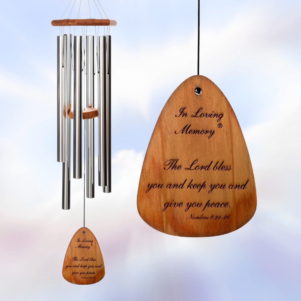 In Loving Memory 42 inch silver wind chime, pre-engraved with the words "In Loving Memory The Lord bless you and keep you and give you peace Numbers 6:24-25" on a light blue background