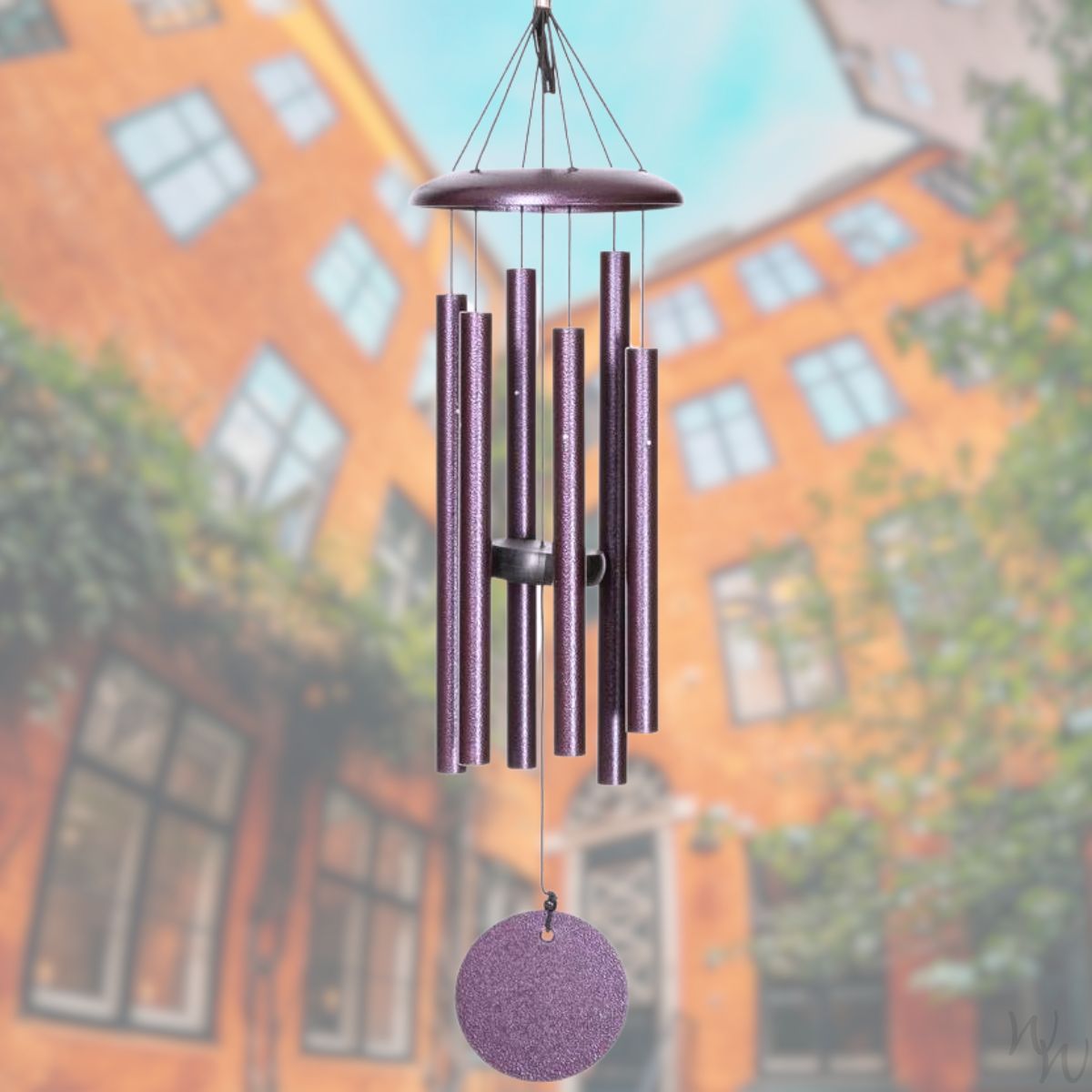 Corinthian brand wind chime that is colored plum, 27 inches, 6 aluminum tubes, and a wooden striker