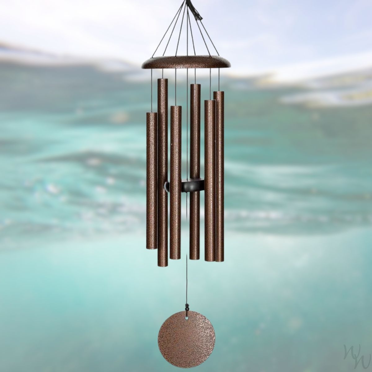 Corinthian brand wind chime that is colored copper, 30 inches, 6 aluminum tubes, and a wooden striker