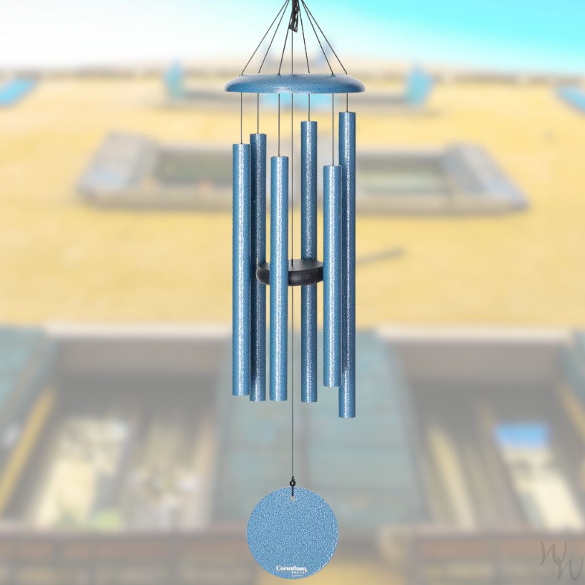 Corinthian brand wind chime that is colored sky blue, 30 inches, 6 aluminum tubes, and a wooden striker