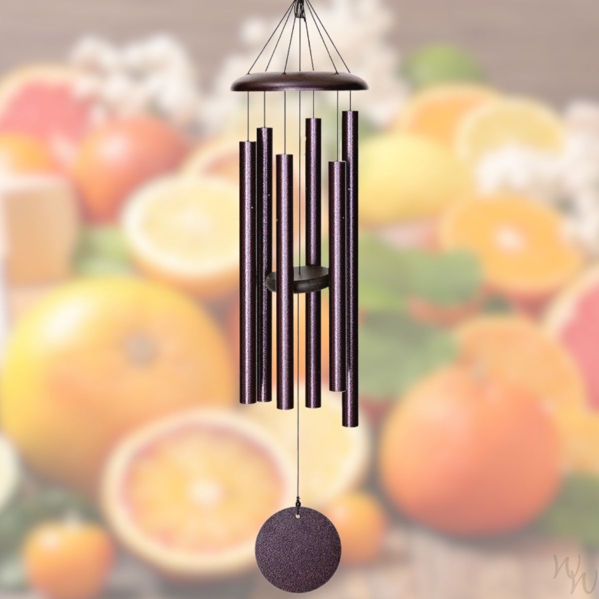 Corinthian brand wind chime that is colored plum, 36 inches, 6 aluminum tubes, and a wooden striker