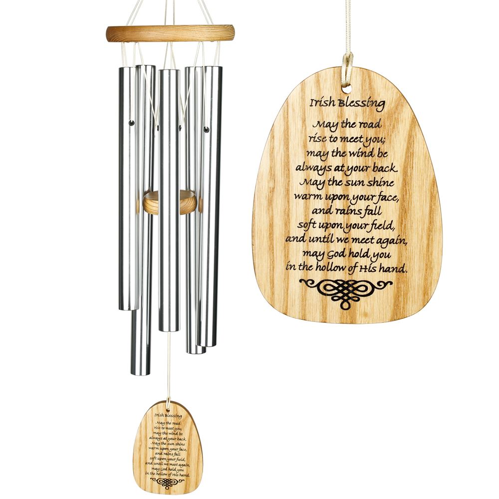 Woodstock Reflections silver wind chime, light wood striker and wind sail, with engraved text that reads " Irish Blessing May the road rise to meet you; May the wind be always at your back. May the sun shine warm upon your face, And rains fall soft upon your field, And until we meet again, May God hold you in the hollow of His hand." on a white background