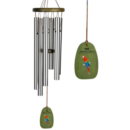 Woodstock Rainforest 24-Inch Wind Chime BEING A 24 INCH hanging chime featuring five SILVER‑tone aluminum tubes suspended from a soft green wash ash‑wood top, with a decorative windcatcher painted with a vivid scarlet macaw motif DISPLAYED IN FRONT OF A WHITE BACKGROUND