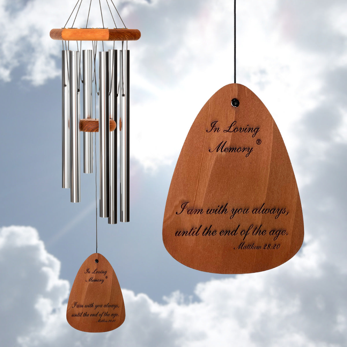 In Loving Memory BRAND wind chime THAT IS 30 inches WITH SILVER ALUMINUM TUBES PRE-ENGRAVED with THE QUOTE, "I AM WITH YOU ALWAYS, UNTIL THE END OF THE AGE. MATTHEW 28:20" ON THE WIND SAIL, ALL OF WHICH IS DISPLAYED IN FRONT OF A LANDSCAPE BACKGROUND