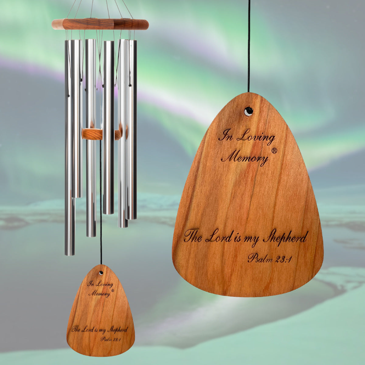 In Loving Memory BRAND wind chime THAT IS 35 inches WITH SILVER ALUMINUM TUBES PRE-ENGRAVED with THE QUOTE, "THE LORD IS MY SHEPHERD. PSALM 23:1" ON THE WIND SAIL WHICH IS DISPLAYED IN FRONT OF A LANDSCAPE BACKGROUND