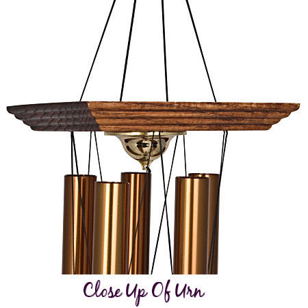 Urn on the suspension platform of the Woodstock brand memorial wind chime