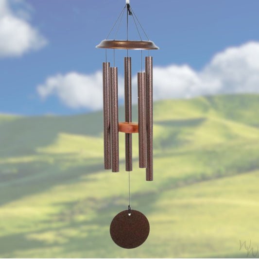 Shenandoah brand wind chime that is bronze, 29 inches, has 5 aluminum tubes, and a wooden striker displayed in front of a landscape background 