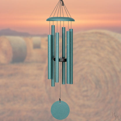 Corinthian brand wind chime that is colored patina green, 30 inches, 6 aluminum tubes, and a wooden striker